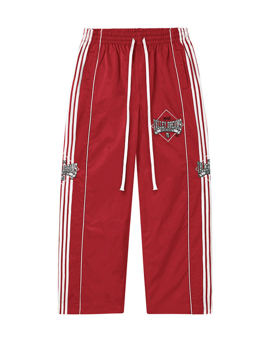 RED STRIPE TRACK PANTS