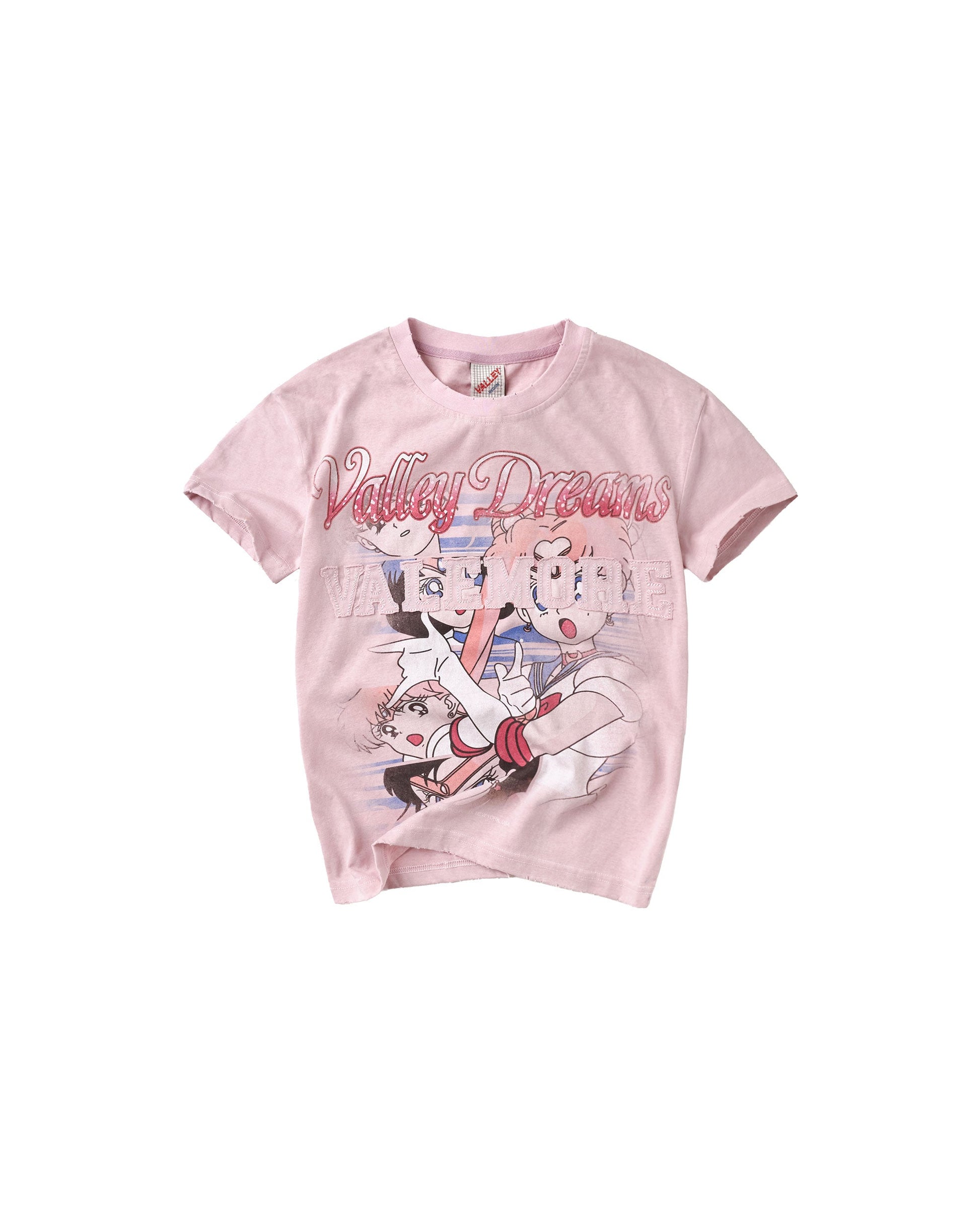 A light pink short-sleeve t-shirt featuring a graphic print of anime characters and the text 'Valley Dreams' in red script across the chest.