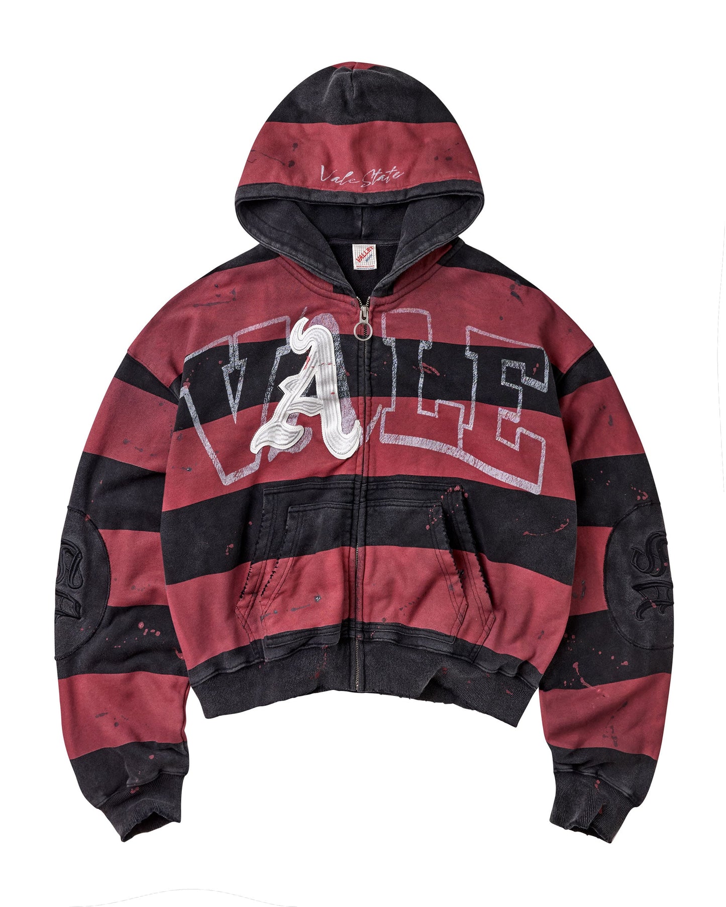 A cropped zip-up hoodie with horizontal red and black stripes, featuring a large white 'A' graphic outlined in white over the chest, a front zipper, and a hood.