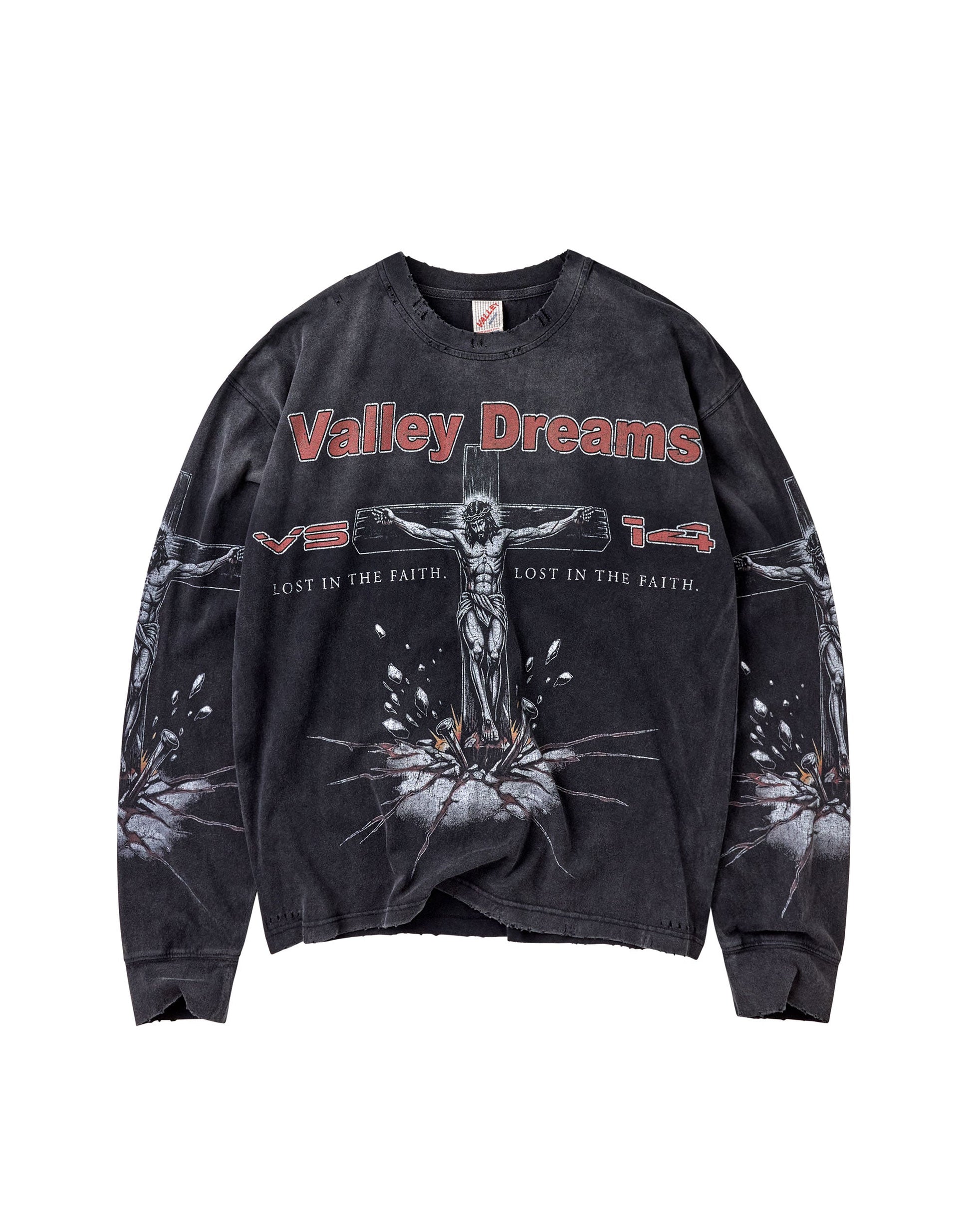 A washed black long-sleeve graphic sweatshirt featuring a crucifix design and the text 'Valley Dreams' across the chest, displayed flat against a white background.