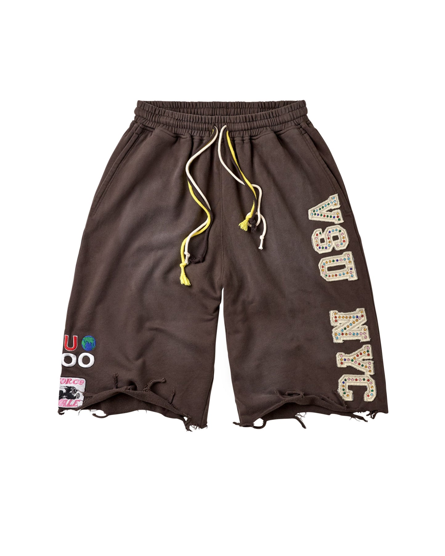 Dark brown athletic shorts with a distressed raw hem, featuring a yellow and white drawstring, 'VSU NYC' text printed vertically on the right leg, and a colorful patch on the left leg.