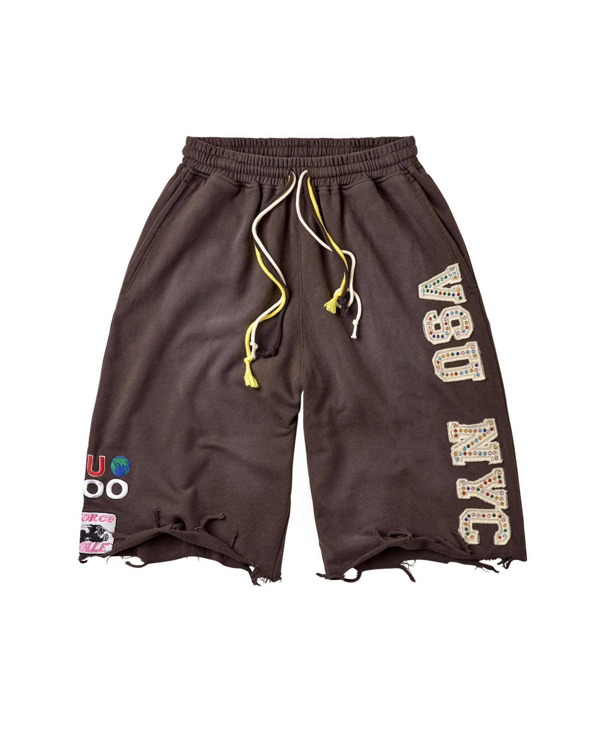 Dark brown athletic shorts with a distressed raw hem, featuring a yellow and white drawstring, 'VSU NYC' text printed vertically on the right leg, and a colorful patch on the left leg.